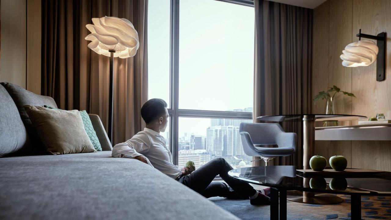 Amari Kuala Lumpur Exterior foto A guest room at the hotel